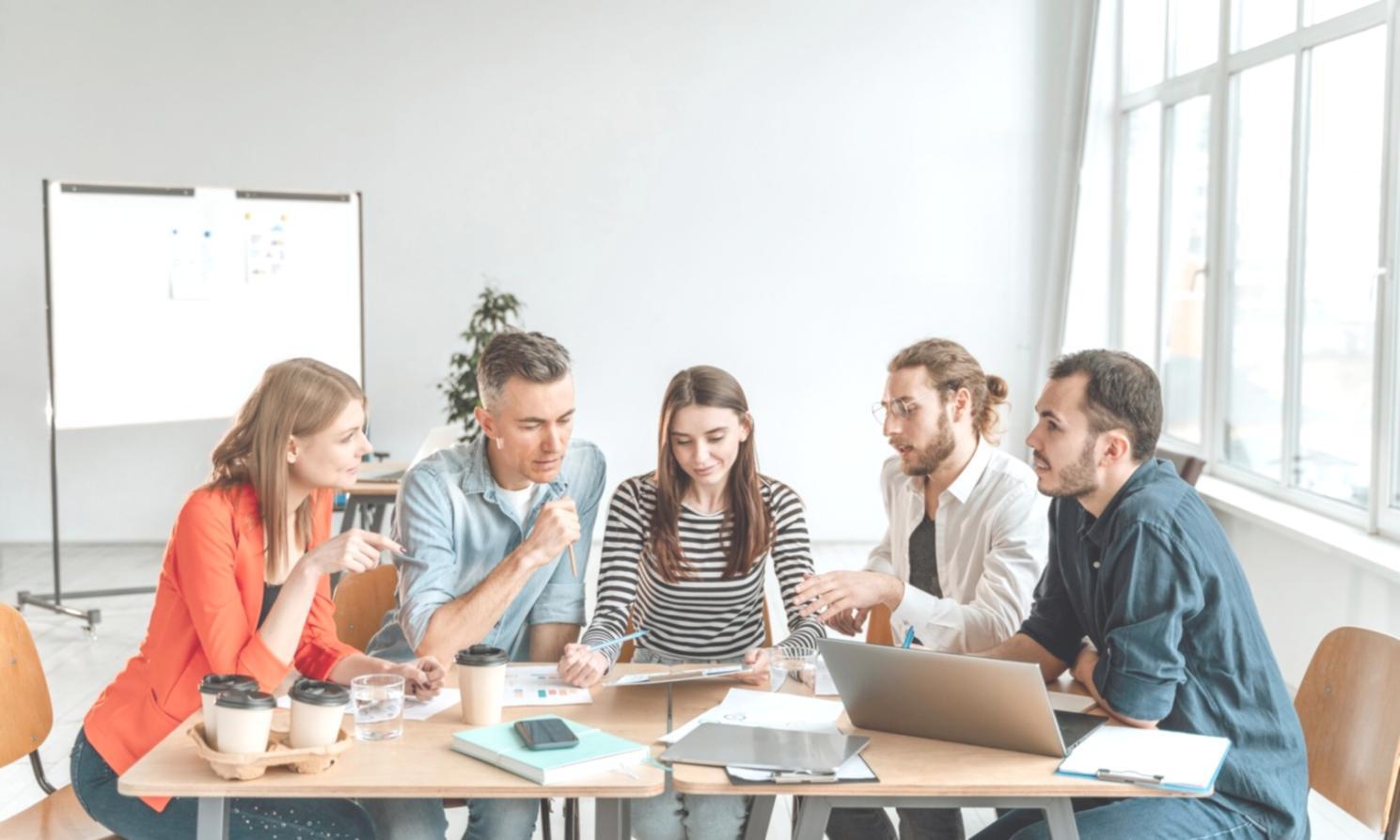 Planning financial goals with notebook and calculator